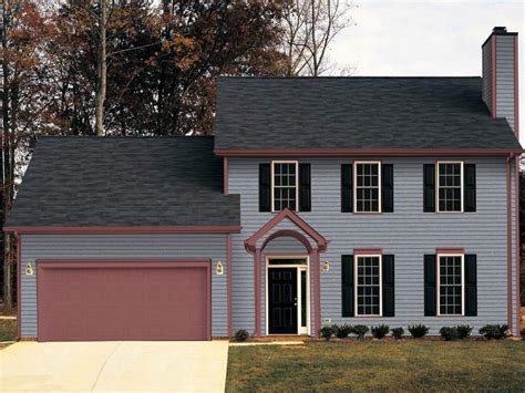 dark gray house with metal roof accent|gray roof design ideas.